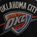 OKLAHOMA CITY THUNDER IN ALL RHINESTONES AS PATCH ON BACK OF MENS VARSITY JACKET
