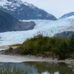 Tourist visiting Mendenhall Glacier. Juneau. Alaska.