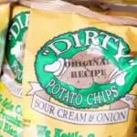 A view of several bags of Utz Dirty Sour Cream and Onion flavor potato chips^ at the store. Los Angeles^ California^ United States - 09-04-2019