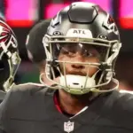 Atlanta Falcons quarterbacks Michael Penix Jr (9) before the game against the Carolina Panthers on January 5^ 2025 at Mercedes-Benz Stadium.