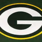 The Green Bay Packers emblem on a team sweatshirt. GREEN Background
