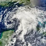 Tropical Storm Alberto. Tropical Storm Alberto formed as a tropical depression early in the morning on June 10^ 2006^ in the Yucatan Channel.. Elements of this image furnished by NASA.