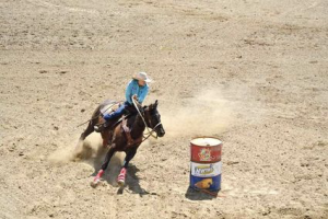 Trista & her horse, Boogie run barrels at the North Dakota State High School Finals, June 13-17, in Bowman, ND. (Photo by Connie Soderholm)