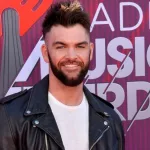 Dylan Scott at the 2019 iHeartRadio Music Awards at the Microsoft Theatre. LOS ANGELES^ CA. March 14^ 2019