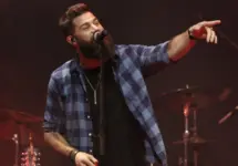 Jordan Davis performs at CMT's RAMJAM on June 3^ 2019 at TopGolf in Nashville^ Tennessee. NASHVILLE^ TN - JUN 3: