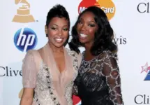 Monica^ Brandy Norwood arrives at the 2011 Pre-GRAMMY Gala And Salute To Industry Icons at Beverly Hilton Hotel on February 12^ 2011 in Beverly Hills^ CA