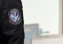 U.S. Customs and Border Protection (CBP) field officers guard a federal building during ICE deportation protests in Downtown LA. Los Angeles^ California^ USA - June 10^ 2025