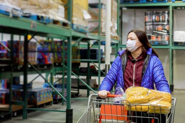 woman-with-protection-face-mask-shopping-cart-supermarket_177613-903-min