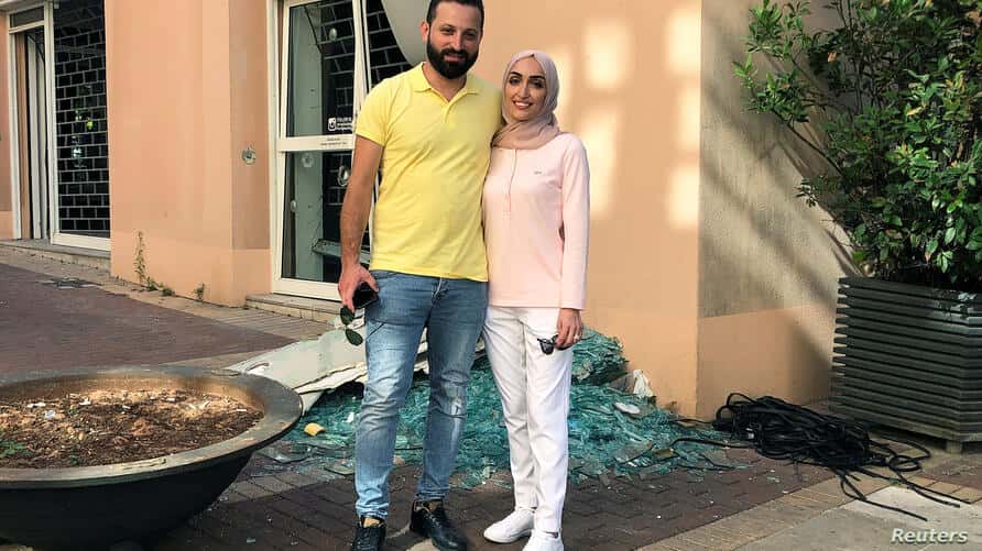bride-israa-seblani-poses-for-a-picture-with-her-husband-ahmad-subeih-in-beirut