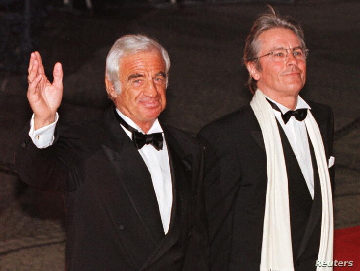 file-photo-french-actors-jean-paul-belmondo-and-alain-delon-pose-for-photographers-as-they-arrive-at-berlins-theatre-schauspielhaus