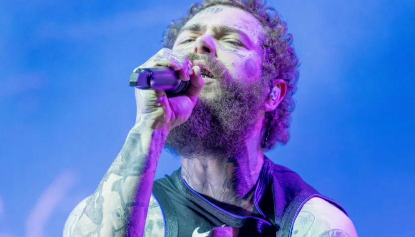 Post Malone performs at Bonnaroo music festival before a huge crowd Manchester^ Tennessee USA - 06-15-2024