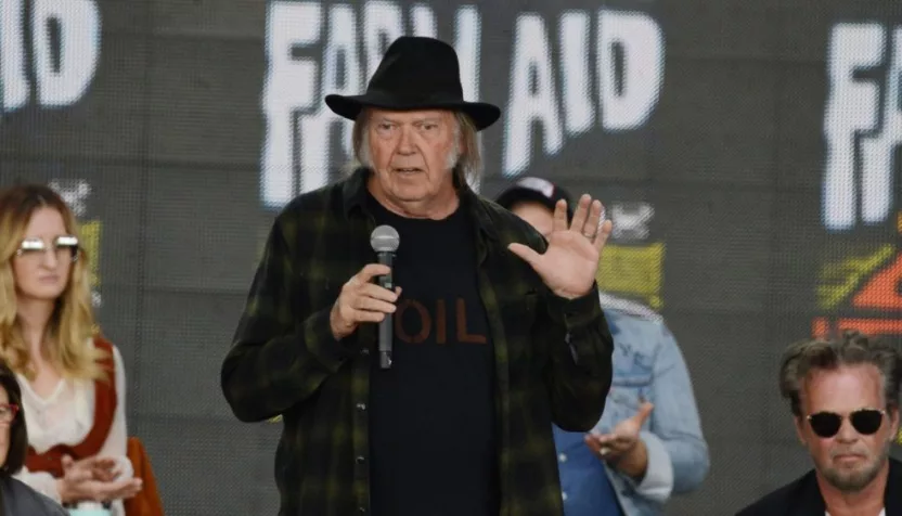 Neil Young talks onstage at the 2018 Farm Aid press conference. Hartford^ CT - September 22^ 2018