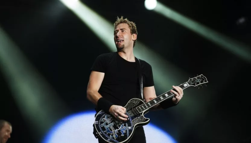 Chad Kroeger^ lead vocalist of the Canadian band Nickelback^ performs during the Rock in Rio 2013 concert^ on September 20^ 2013 in Rio de Janeiro^ Brazil.
