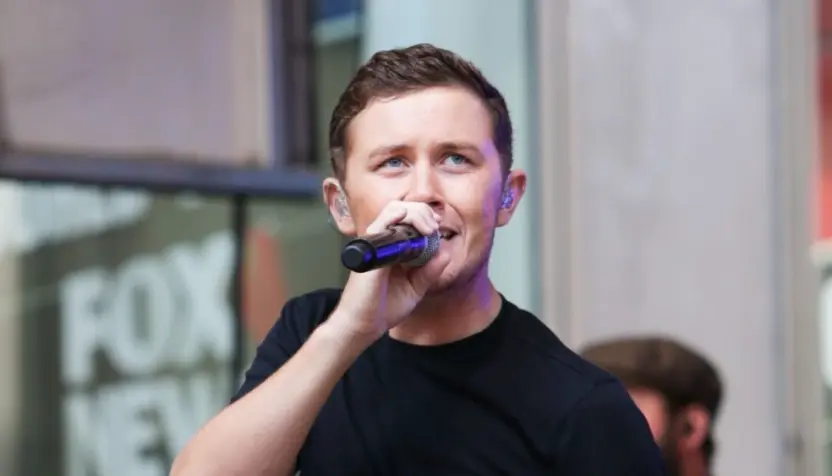Scotty McCreery performs onstage at Fox and Friends' All-American Summer Concert Series at 48th Street and 6th Avenue on July 31^ 2015 in New York City.