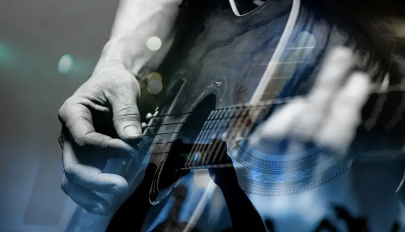 country artist/Guitarist with the audience in a double exposure