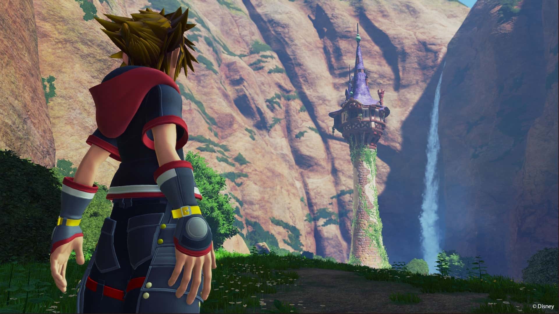 Avatar in Kingdom Hearts 3 looks out onto Rapunzel's tower in the middle of a valley