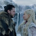 John Snow and Daenerys Targaryen looking at each other in front of a snowy waterfall