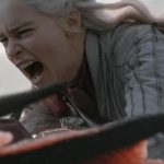 Daenerys sits on the back of a red dragon screaming, presumably going into battle
