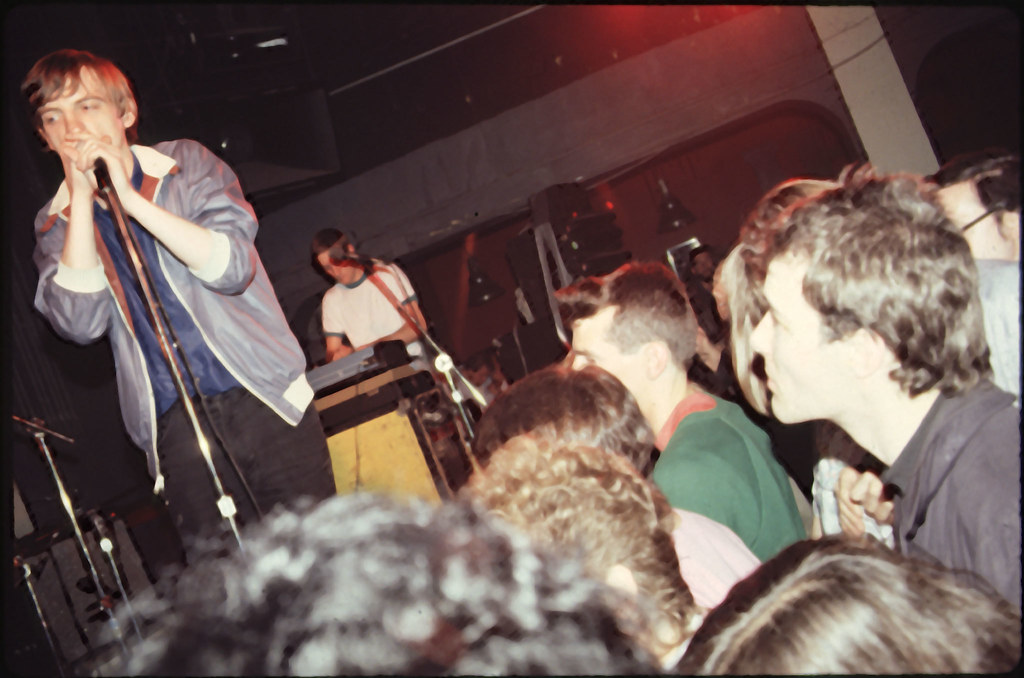 Jello Biafra (lead singer of punk band Dead Kennedys) watches Mark E. Smith at a Fall concert at the I-Beam nightclub in San Francisco on July 25th, 1981.