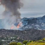 Pacific Palisades^ California - May 16^ 2021: Palisades fire burning through Topanga Canyon.