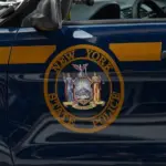 New York State Police Car. Emblem on Door of Trooper Car Manhattan^ New York^USA - November 11. 2019