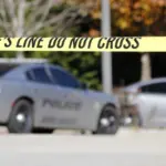 Crime scene tape blocks the entrance to Smile Creators Family and Cosmetic Dentistry on Jonesboro Road. McDonough^ Georgia- December 6^ 2018