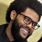 getty_weekendtiltedsmiling_112321