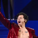 getty_harrystylesredjacketbrits_072323241722