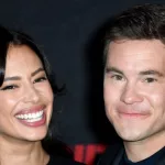 getty_adam_devine_and_wife_10032023266557