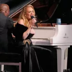 getty_adelesingingatpiano_102923186228