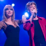 getty_taylorswiftandmickjagger_112823_0862514