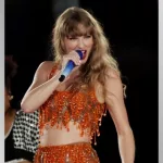 getty_taylorswiftinorange_030724161188