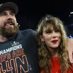 getty_taylorandtravisonthefield_020124490100