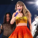 getty_taylorswiftgoldandorange_051724603213