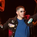 getty_nickjonasonstagearmraised_072524727474