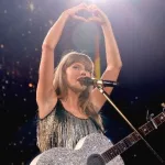 getty_taylorswifthearthands_121324153264