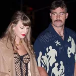 getty_taylorswiftandtraviskelceholdinghands_011625791931