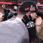 getty_taylorandtraviskissafc2025_012725482246