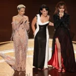 getty_raye20doja20lisa20oscars20_030225198783