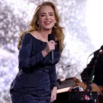 getty_adele20smiling20onstage_060925510629