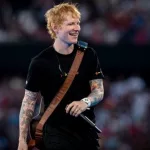 getty_edsheeranonstagesmiling_063025736509