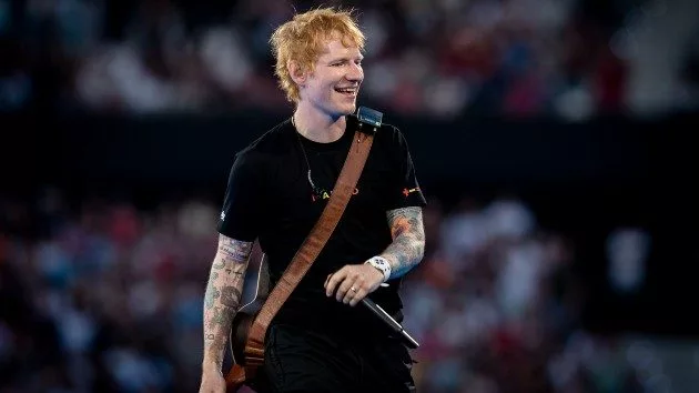 getty_edsheeranonstagesmiling_063025736509