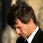 getty_louis20tomlinson20at20funeral_100725628289