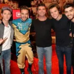 getty_simoncowellandi1_112525603660