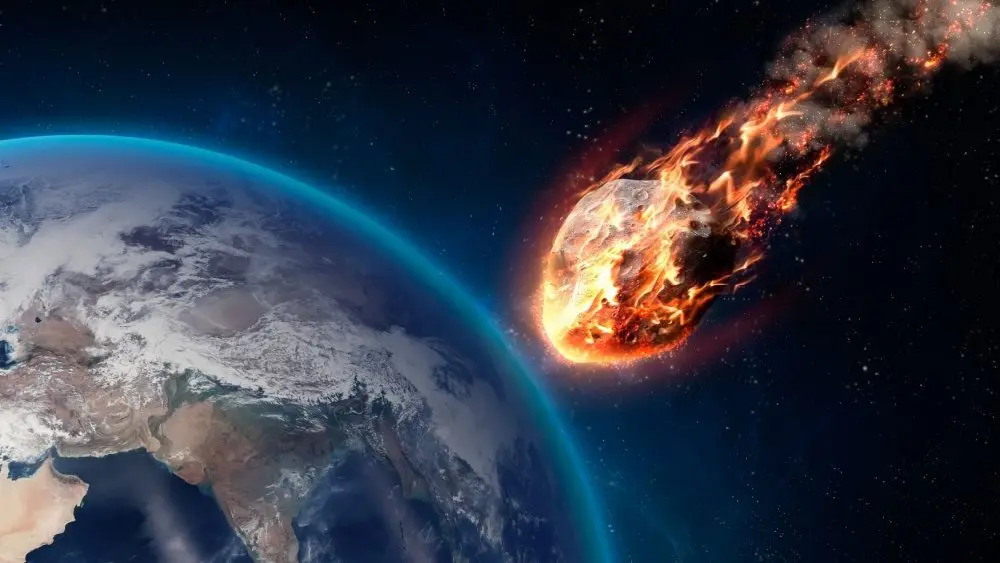 A Meteor glowing as it enters the Earth's atmosphere. Elements of this image furnished by NASA