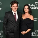 getty_charlieputhandpregnantwife_031226354083