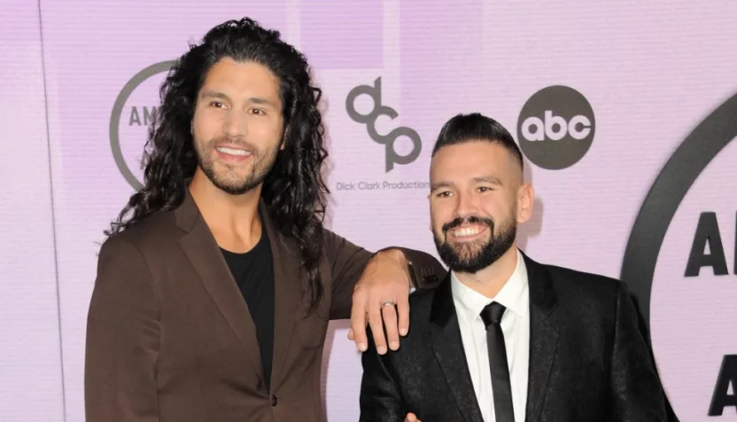 Dan Smyers and Shay Mooney of Dan + Shay at the 2022 American Music Awards held at the Microsoft Theater in Los Angeles^ USA on November 20^ 2022.