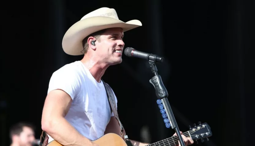 Dustin Lynch performs during the 'Kick The Dust Up' Tour at Vanderbilt Stadium on July 11^ 2015 in Nashville^ Tennessee.