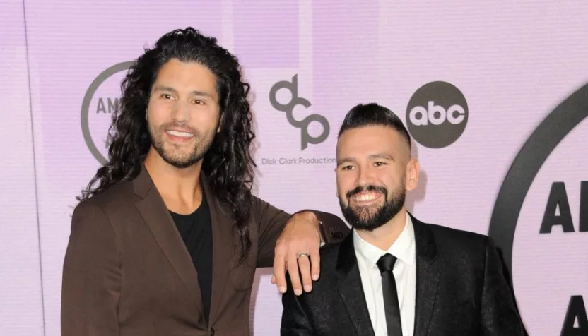 Dan Smyers and Shay Mooney of Dan + Shay at the 2022 American Music Awards held at the Microsoft Theater in Los Angeles^ USA on November 20^ 2022.