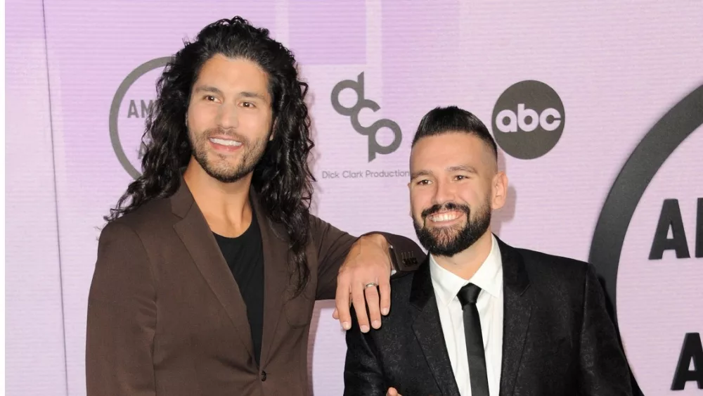 Dan Smyers and Shay Mooney of Dan + Shay at the 2022 American Music Awards ^ Microsoft Theater in Los Angeles^ USA on November 20^ 2022.